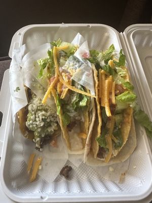 From left: carne asada taco, gabacho taco, and super taco  at Tacotarian - Downtown LV in Las Vegas