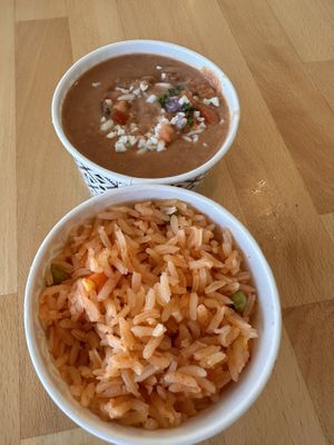 Oops - we kind of messed it up before getting pic. It was prettier when served to us. (Rice and beans.)  at Tacotarian - Downtown LV in Las Vegas