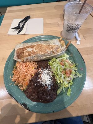 Carne asada burrito with rice,beans,salad  at Tacotarian - Downtown LV in Las Vegas