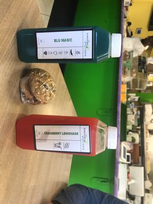 Starter juice and dessert of oatmeal raisin cookies while we wait for our entrees    at Sunshine Vegan Eats in Buffalo