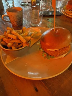 Crispy Seitan burger with salt and pepper fries  at Shrub in Chester