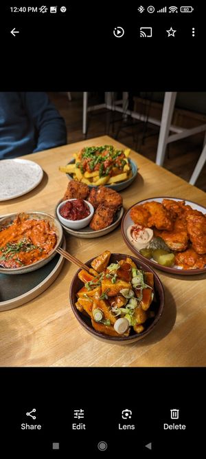 Loaded fries, fried artichokes, tofu and camembert at Shrub in Chester