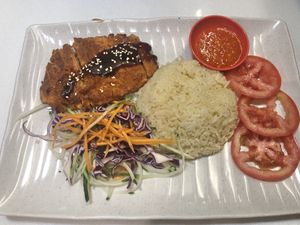 vegetarian chicken rice or black pepper chicken chop rice? $5/6?  at Red Apple Veggie Cafe 红苹果素食 - Fortune Centre in Central Singapore