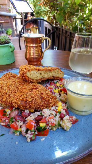 Schnitzel with quinoa salad (extra points for pineapples!!) at Living Vino @ So Lucky Bar in Tbilisi