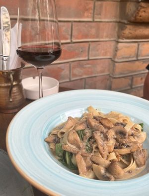 Паста с грибами и красное вино  at Living Vino @ So Lucky Bar in Tbilisi