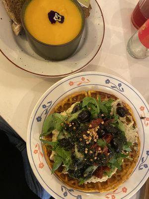 Small pumpkin soup with 2 slices of bread (5,50€) + Savory sweet potato waffle (14€)  at CLO in Antwerpen
