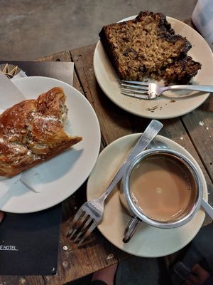 Danish nut, banana chocolate cake, and soy chai.. all vegan! at Café Moktan and Bakerys in Rishikesh