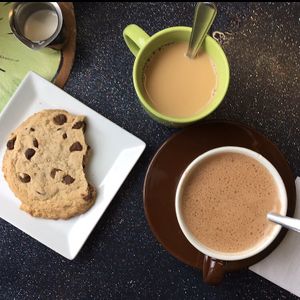 Vegan chocolate chip cookie, coffee, coconut milk hot chocolate  at Kiwi Cafe in Chester