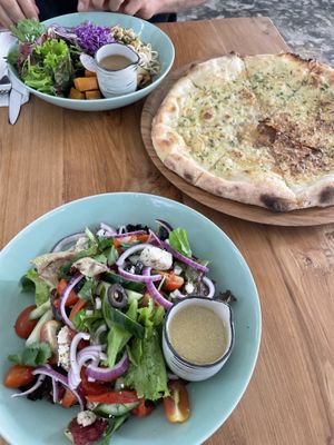 Vegan pizza and salad  at Nourish in Ungasan