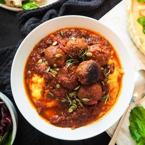 Orange & Fennel Polpette with Sugo at The Plant Kitchen Co in Sydney