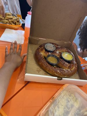 Gigantic pretzel with honey mustard, cheese, and marinara sauce at The Rabbit Hole in Pompano Beach