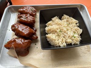 Bbq wyngs and jasmine rice   at The Rabbit Hole in Pompano Beach