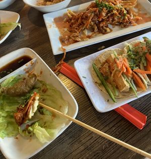Sorry everything is half eaten! The kimchi fries are top left, Vietnamese tofu tacos bottom left and dumplings bottom right  at Bé-Em Asian Kitchen in Charlotte