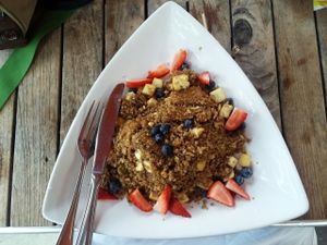 Warm and nutty vegan cinnamon quinoa - amazing!  at The Cafe at Books and Books in Miami Beach