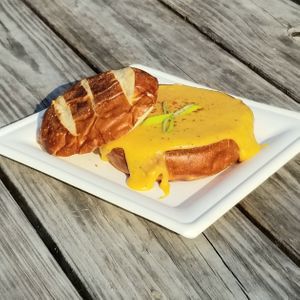 Beer Cheese Soup - veganized! All October we'll be featuring different Texas brewery's Octoberfest brews to make this delicious handcrafted soup! Served in a pretzel bowl! at Bone-a-fide Vegan in Austin