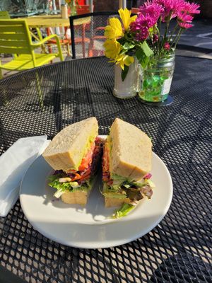 House vegan sandwich w/sourdo brd. Subbed avocado for the daiya chs. So good. at Sunflour Community Bakery in Rome