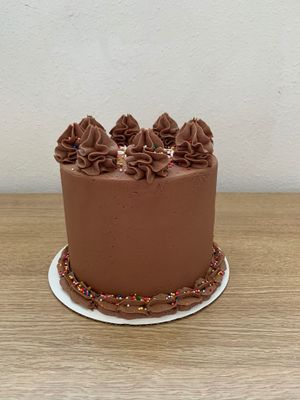 Vanilla and chocolate marbled cake with chocolate frosting! at Sweet Leaf Cakery in Idaho Falls