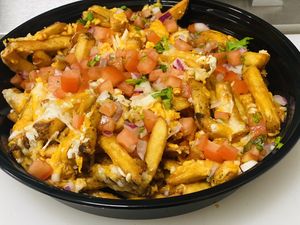 Overloaded Fries with Vegan Cheese & Pico de Gallo at Good Roots Natural Market in Haverstraw