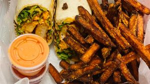 Vegan Buffalo Chick’N Wrap with Sweet Potato Fries at Good Roots Natural Market in Haverstraw