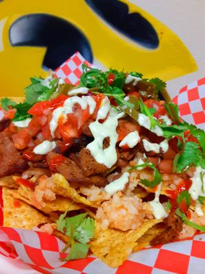 Loaded Carne Asada nachos offered during the Taco Riot special menu! at Pizza Riot in Chico