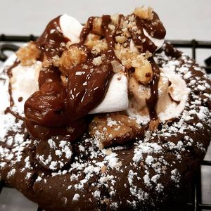 Organic Rocky Road double chocolate brownie cookie topped with marshmallows, coconut caramel, walnuts, powdered sugar and chocolate. at Pizza Riot in Chico
