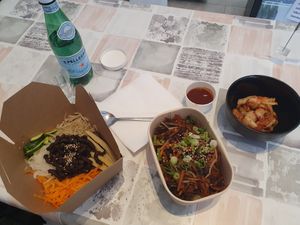 Left: bibimbap, middle: soy bulgogi bowl, right: kimchi at De Patchka in Amsterdam