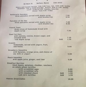 front of menu at Chase's Daily in Belfast