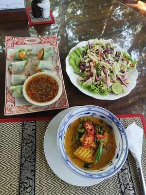 Veggie spring rolls (carrot cucumber and lettuce), papaya salad and amok curry with tofu at Peace Cafe in Siem Reap