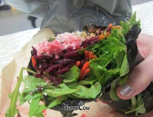 Norita Wrap: cauliflower rice, beets, carrots, guacamole, vege pate, greens, nori at Cruda Cafe in Toronto
