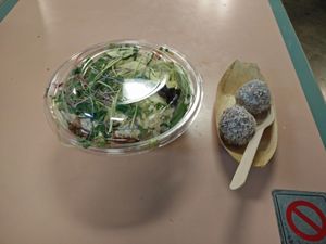 salad with quinoa, raw chocolate balls at Cruda Cafe in Toronto