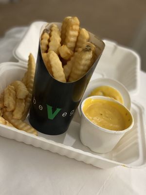 Fries with bomb cheese sauce  at SoBe Vegan in Fort Lauderdale