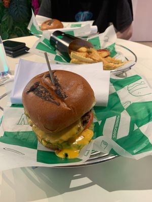 Sobe stack closest to camera, fries in the middle, and classic chick’n furthest from camera  at SoBe Vegan in Fort Lauderdale