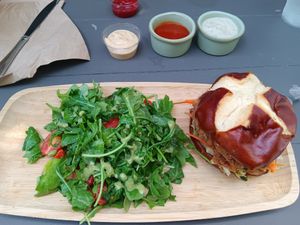Mushroom sandwich with arugula salad at SoBe Vegan in Fort Lauderdale