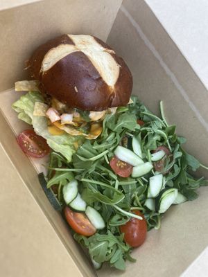 Queso burger with side saladd  at SoBe Vegan in Fort Lauderdale