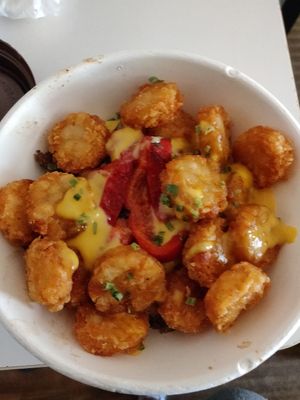 Egg, sausage and cheese bowl. Has a good amount of sausage and egg underneath the tater tots at SoBe Vegan in Fort Lauderdale