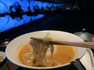Spicy miso ramen (with thick onion slices on top) at Vegan Ramen UZU Kyoto in Kyoto