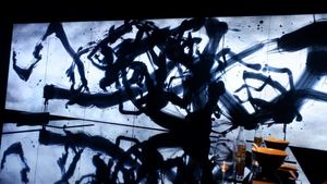 Moving Art (calligraphy) on a huge screen at Vegan Ramen UZU Kyoto in Kyoto