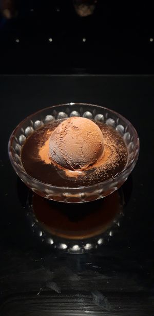 Chocolate ice cream with syrup at Vegan Ramen UZU Kyoto in Kyoto