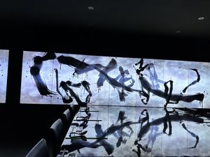 Digital art in the restaurant seating area  at Vegan Ramen UZU Kyoto in Kyoto