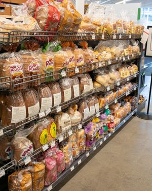 Bread aisle with many options at Belfast Community Co-op in Belfast