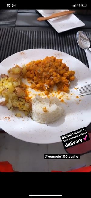 Menú diario, garbanzos estilo indio, papas rústicas y arroz + jugo o agua + postre  at Espacio 100 in Coquimbo