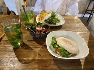 Yemaya’s burger, portion tempeh, vegan pom at Yemaya's Vegan Corner in Amsterdam