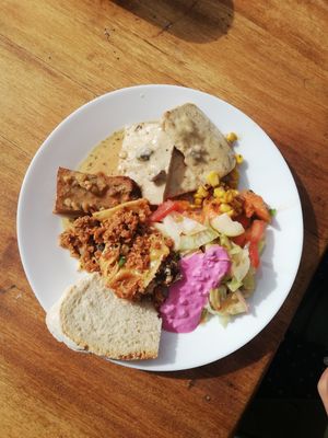 Lasanha de soja, seitan com molho de amendoim, molho de beterraba e iogurte. Que delícia! at Impact House in Lisbon