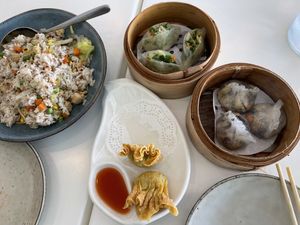 Salty fish and chicken fried rice, chinese coriander dumplings, mushroom dumplings, and fried wontons .  at Easy House in Gold Coast