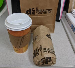 Wrap & Coffee w/ Oatmilk & RedEye at D'Lite Healthy On The Go in Scottsdale