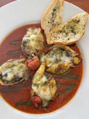 Vegan ratatouille stuffed shells with added vegan mozzarella cheese. So so good    at Tommyknocker's in Port Townsend