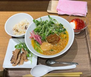 Golden sesame ramen, with extra soy. Came with a side of rice and a dessert (plant based yoghurt and jam?)  at T's Tantan - JR Ikebukuro in Tokyo