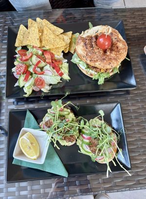 Avo toast with tempeh and vegan burger  at Cafe Nateeva in Prievidza