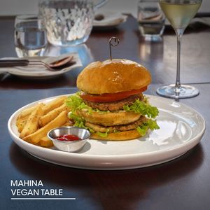 Jalapeño Double Chicken Burger

Vegan Double Chicken Patty | Special Sauce | Vegan Bun, Jalapeno, Tomato, Grilled Onion, Ezabel | French Fries at Mahina Vegan Table in Seoul