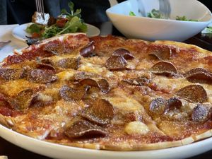 Plant-based pepperoni pizza at Mahina Vegan Table in Seoul